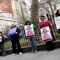 Nearly 1,000 public workers and their unions massed at lunch time in front of City Hall.